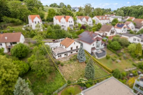 Immobilie in Birkenau - Wohnen mit Weitblick – Einfamilienhaus mit Einliegerwohnung in attraktiver Hanglage - Bild 1