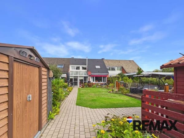 Immobilie in Walsrode - Charmantes Reihenmittelhaus mit ca. 130 m² Wohnfläche, Garage & schönem Garten - Bild 4