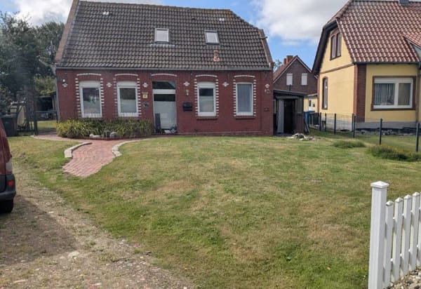 Immobilie in Hinte - Einfamilienhaus mit Kaminofen, Werkstatt, Eigentumsgrundstück in Hinte zu verkaufen! - Bild 0