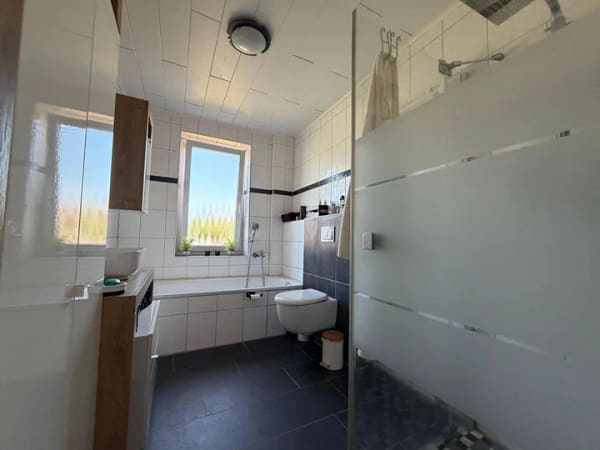 Immobilie in Hinte - Einfamilienhaus mit Kaminofen, Werkstatt, Eigentumsgrundstück in Hinte zu verkaufen! - Bild 4