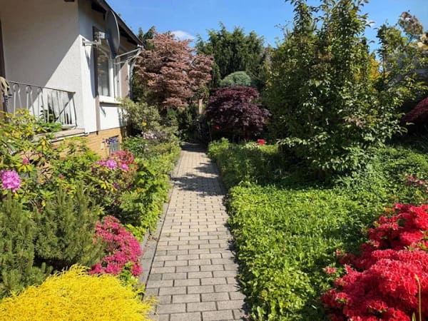 Immobilie in Hasbergen - Großzügiges Wohnhaus mit separater Wohneinheit, zwei Garagen und großem Grundstück in ruhiger Sackgassenlage - Bild 4