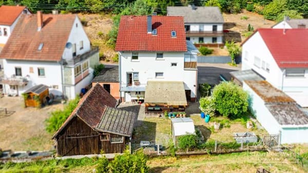 Immobilie in Lemberg - Gepflegtes Zweifamilienhaus mit Garten am Bachlauf, Garage und viel Platz in Lemberg-Glashütte - Bild 4