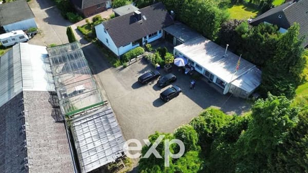 Immobilie in Rehburg-Loccum - 16.000qm mit Wohnhaus und Anliegerwohnung sowie Gewerbe und  Garagen - Bild 2