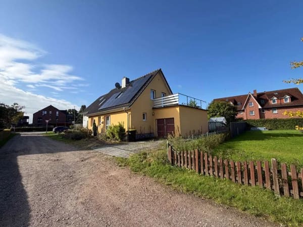 Immobilie in Tostedt - Einfamilienhaus mit Garage und viel Entwicklungspotenzial - Bild 1
