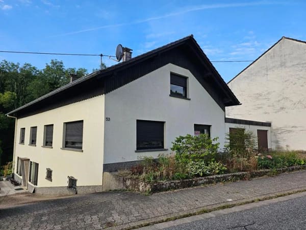Immobilie in Merzig - Gemütliches Einfamilienhaus + 2 Baugrundstücke in Merzig-Mondorf. Sofort verfügbar - Bild 0