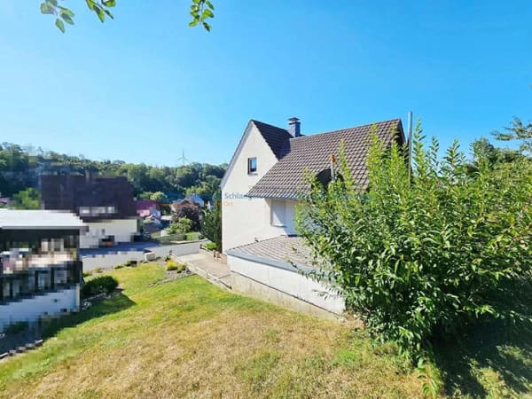 Immobilie in Schlangen - Zweifamilienhaus mit großem Garten und altem Obstbaumbestand ! - Bild 1