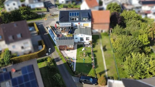 Immobilie in Biebertal - Großzügiges Mehrfamilienhaus mit außergewöhnlichem Flächenangebot und vielseitigem Potenzial - Bild 3