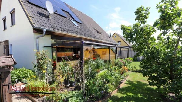 Immobilie in Niepars - Charmante Doppelhaushälfte mit Sommergarten, Photovoltaikanlage und gepflegtem Grundstück - Bild 0