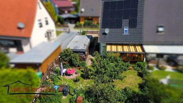 Immobilie in Niepars - Charmante Doppelhaushälfte mit Sommergarten, Photovoltaikanlage und gepflegtem Grundstück - Bild 3