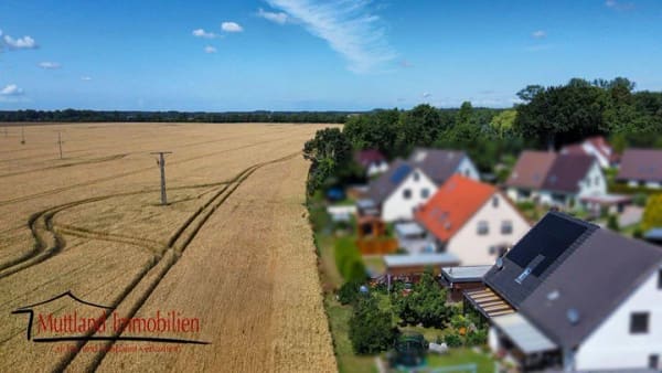Immobilie in Niepars - Charmante Doppelhaushälfte mit Sommergarten, Photovoltaikanlage und gepflegtem Grundstück - Bild 4