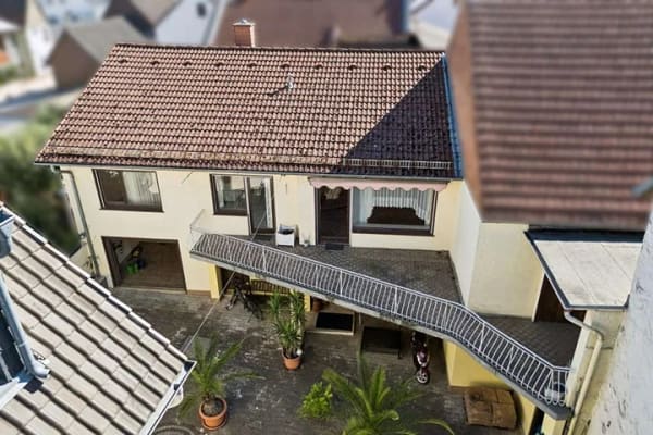 Immobilie in Wöllstadt - Mehrfamilienhaus in Wöllstadt (Ober-Wöllstadt) - Bild 1