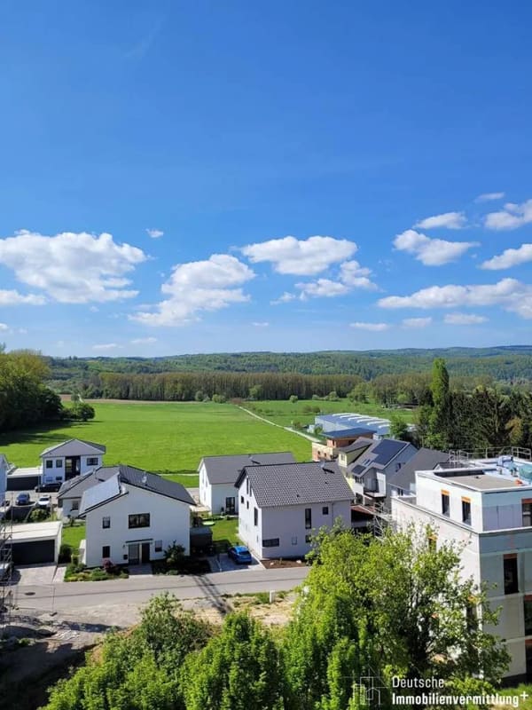 Immobilie in Mauer - 3-Zimmerwohnung inkl. zwei TG-Stellplätze, Keller, Balkon und Blick aufs Grüne! - Bild 2