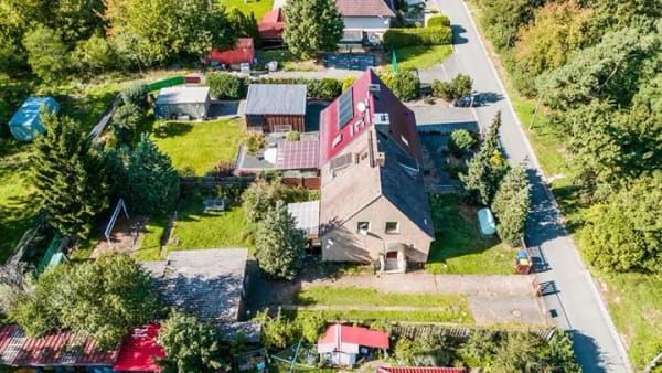 Immobilie in Nünchritz - Doppelhaushälfte mit Entwicklungspotenzial in direkter Waldlage: mit Garten, Terrasse & Garage! - Bild 3