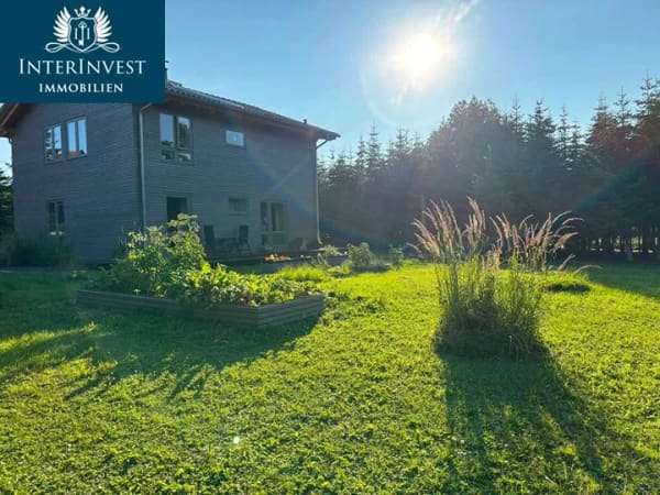 Immobilie in Neukalen - Wohnen, wo andere Erholung suchen – modernes Zuhause auf ca. 3.000 m² parkähnlichem Grundstück - Bild 1
