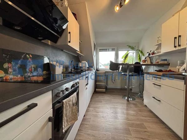 Immobilie in Neuendettelsau - Helle 3-Zimmer-Dachgeschosswohnung mit Loggia und Garage - Bild 4