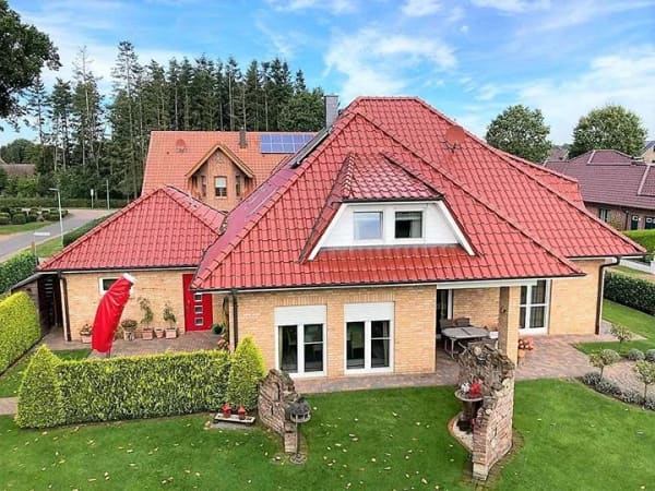Immobilie in Herzlake - Ein Zuhause, das Großzügigkeit und Komfort verbindet - Winkelwalmdachbungalow in Dohren - Bild 0