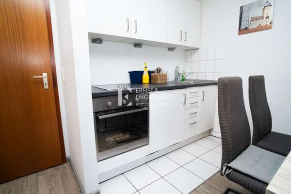 Immobilie in Kürnach - Gepflegte 1,5-Zimmer-Wohnung mit durchdachtem Grundriss & Stellplatz - Bild 2