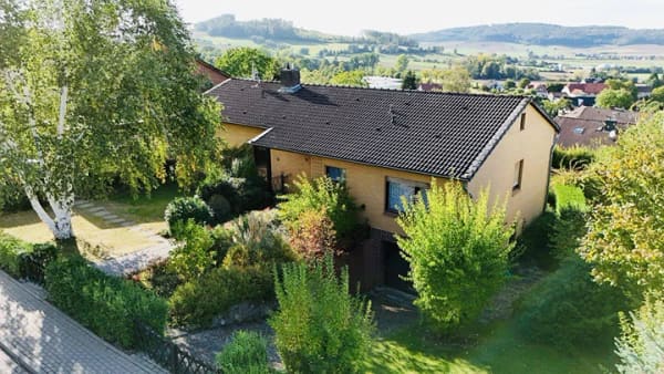 Immobilie in Kalefeld - Großzügiges Einfamilienhaus mit herrlicher Aussicht und viel Potential in ruhiger Wohnlage von Echte - Bild 0