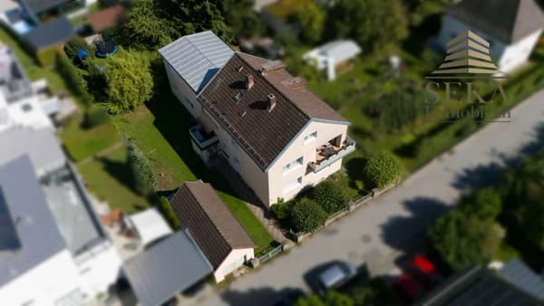Immobilie in Deggendorf - Vermietetes Mehrfamilienhaus mit 5 Wohnungen und großem Grundstück in zentrumsnaher Lage von Deggend - Bild 1