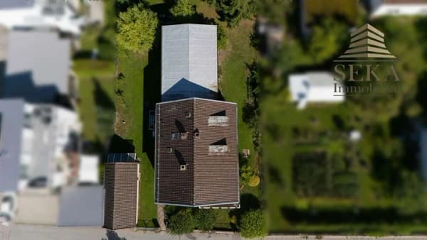 Immobilie in Deggendorf - Vermietetes Mehrfamilienhaus mit 5 Wohnungen und großem Grundstück in zentrumsnaher Lage von Deggend - Bild 2