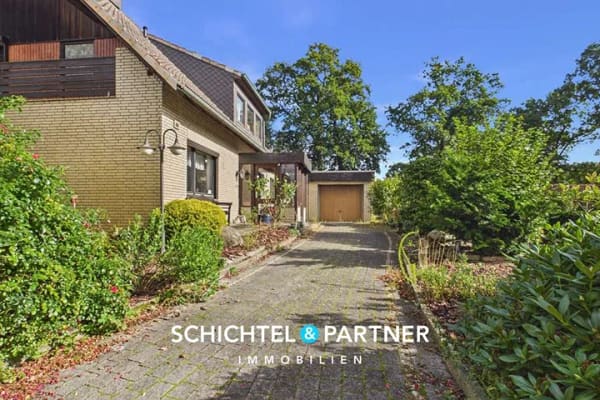 Immobilie in Lilienthal - Moorhausen | Einfamilienhaus mit Garage & schönem Garten in Lilienthal - Bild 1