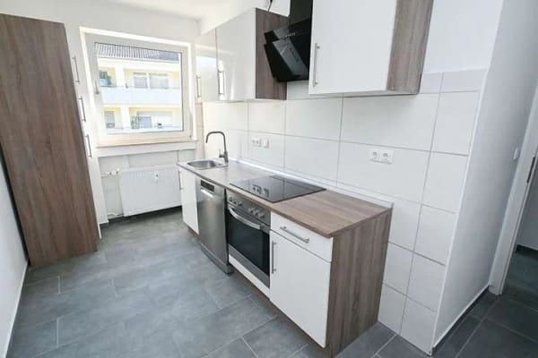 Immobilie in Georgsmarienhütte - Sanierte 3-Zimmer-Eigentumswohnung mit Balkon und neuer Einbauküche in Georgsmarienhütte! - Bild 0
