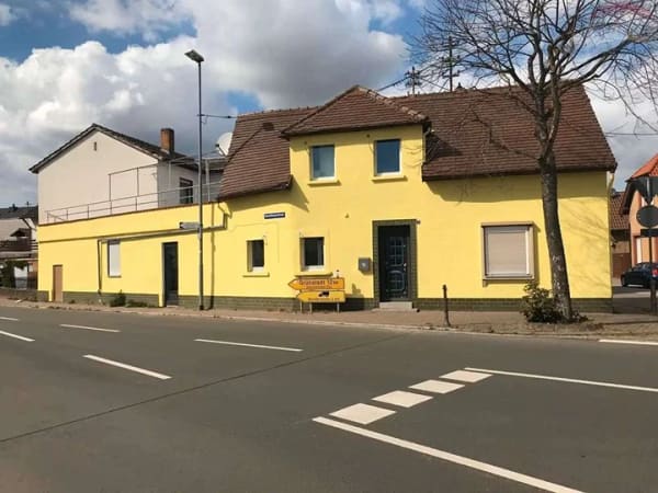 Immobilie in Heßheim - Sanierter Wohntraum – vermietetes Einfamilienhaus mit Dachterrasse in Heßheim - Bild 1