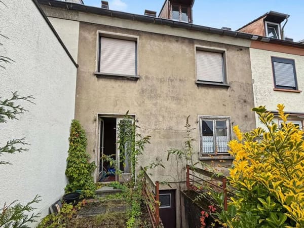 Immobilie in Lünen - Renovierungsbedürftiges Reihenmittelhaus mit viel Gestaltungspotenzial in Alstedde bei Lünen - Bild 1