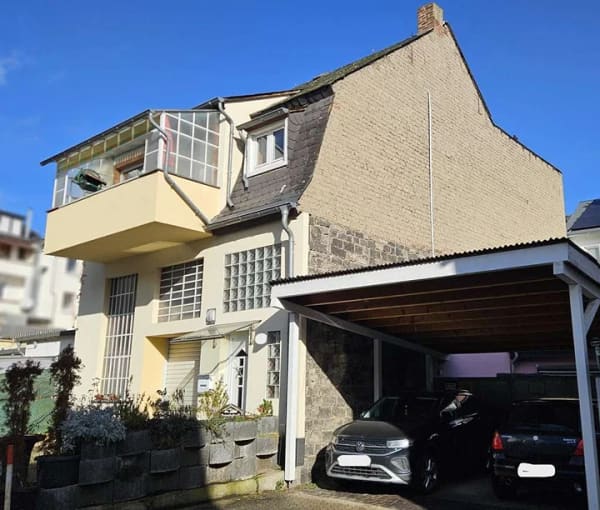 Immobilie in Mayen - Stadthaus in der Innenstadt mit Wohnbereich, Balkonen und großer Garage - Bild 1