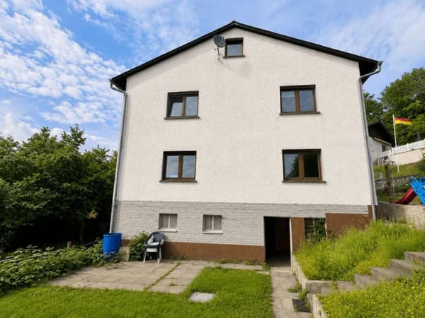 Immobilie in Mengerskirchen - Panoramablick inklusive Zweifamilienhaus! - Bild 1