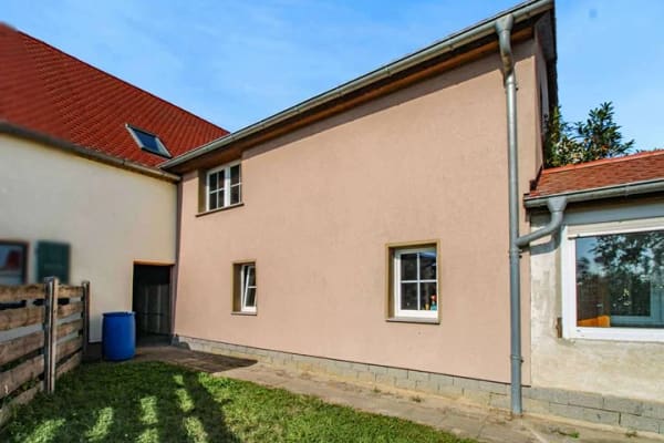 Immobilie in Delitzsch - Charmante Doppelhaushälfte mit Geschichte und großem Grundstück - Bild 1