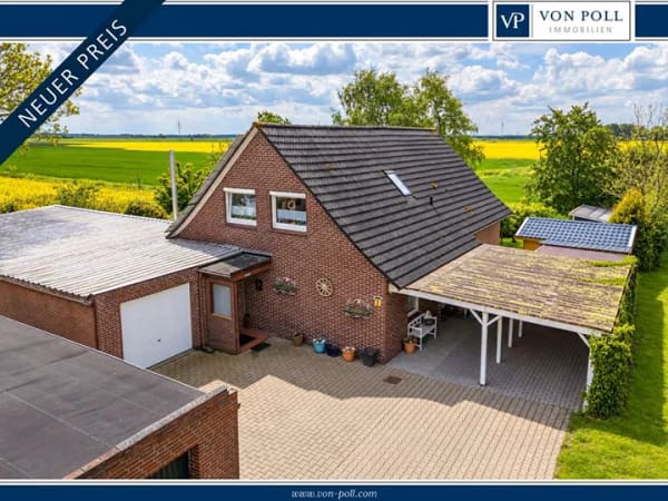 Immobilie in Dornum - Einfamilienhaus mit Gartenidylle und Einliegerwohnung in Feldrandlage von Nesse - Bild 0