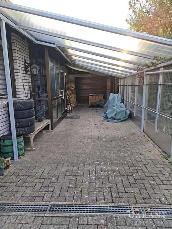Immobilie in Tiefenbronn - Großzügiger Bungalow mit Einliegerwohnung, Wärmepumpe, PV & Traumgarten - Bild 2