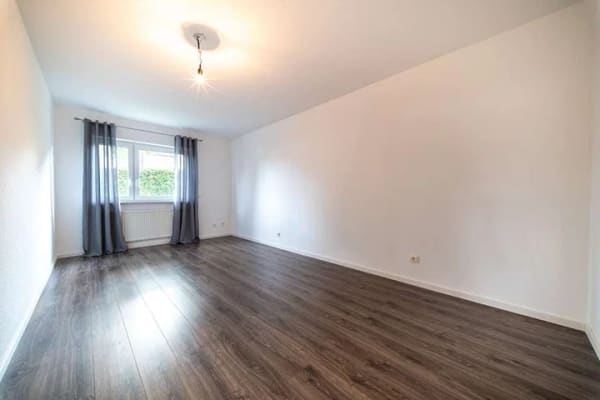 Immobilie in Kastellaun - Großzügige Hochparterre-Wohnung mit neuen Fenstern und sonnigem Balkon - Bild 4