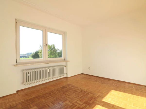 Immobilie in Freilassing - Teilvermietetes Mehrfamilienhaus in sehr schöner Lage mit großzügigem Grundstück und Alpenblick - Bild 4