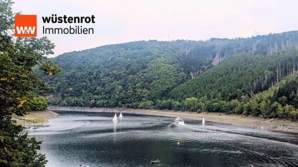 Immobilie in Simmerath - Einzigartiges Mehrfamilienhaus mit Seeblick – Kapitalanlage in begehrter Eifellage - Bild 0