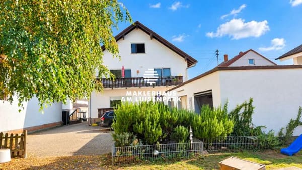 Immobilie in Lustadt - Solides Mehrfamilienhaus mit 364 m² Wohnfläche und großem Gartengrundstück – 3 ETWs & Eigennutzung - Bild 1