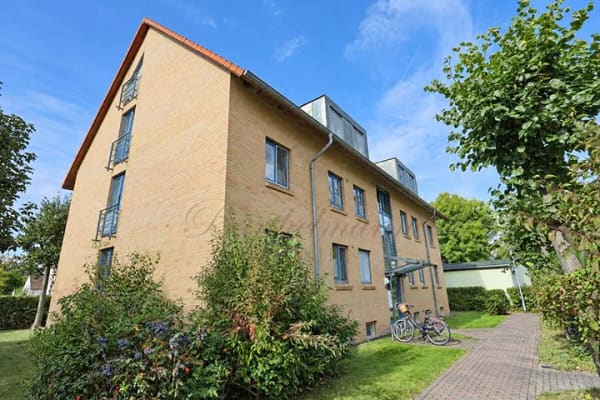 Immobilie in Machern - Helle 3-Zimmer-Dachgeschosswohnung auf 2 Ebenen mit Loggia & Carport – vermietet für Kapitalanleger - Bild 2