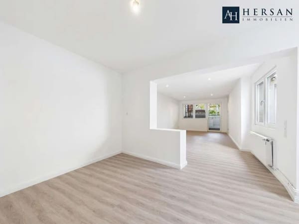 Immobilie in Übach-Palenberg - Charmantes Einfamilienhaus mit 5 Zimmern, Wintergarten, Dachterrasse und großzügigem Garten - Bild 2