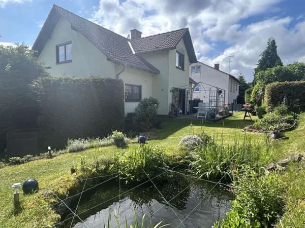 Immobilie in Mossautal - Top gepflegtes Einfamilienhaus mit ca. 5.000 m² Wiese - Bild 2