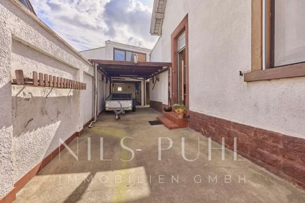 Immobilie in Grünstadt - Einfamilienhaus in Grünstadt mit kleinem Garten, Garage und separatem Hobbyraum - Bild 2
