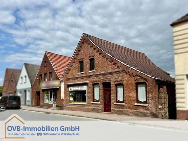 Immobilie in Moormerland - Zwei Häuser mit Bootsanleger zu einem Preis! Direkt am Wasser! - Bild 0