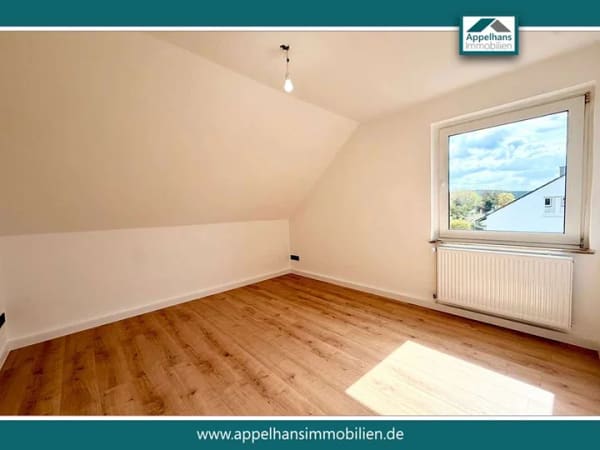 Immobilie in Hilter - Attraktive Kapitalanlage oder neues Zuhause – modernisierte Dachgeschosswohnung - Bild 1