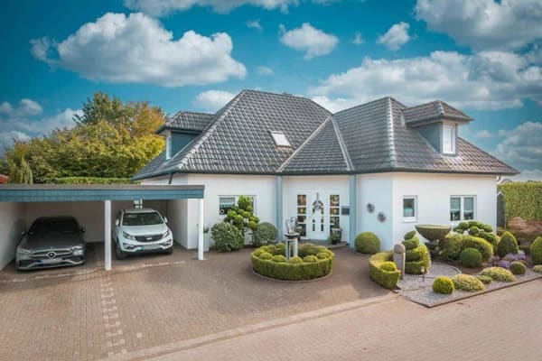 Immobilie in Langen - Gepflegtes Einfamilienhaus mit vielseitiger Raumaufteilung und hochwertiger Ausstattung - Bild 2