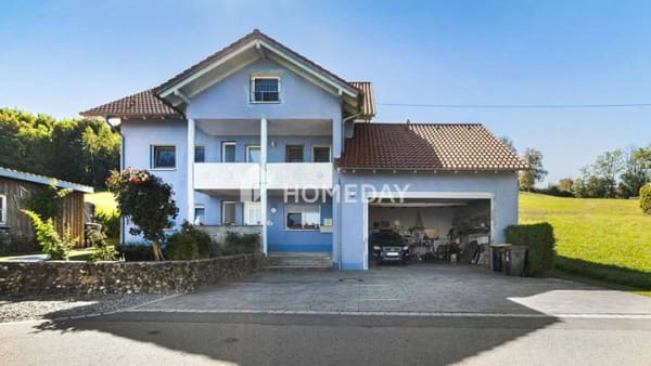 Immobilie in Lachen - Viel Platz für Wohnträume! Mehrfamilienhaus mit Doppelgarage und Naturblick - Bild 0