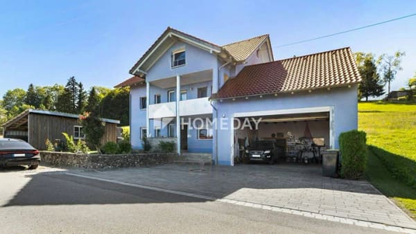 Immobilie in Lachen - Viel Platz für Wohnträume! Mehrfamilienhaus mit Doppelgarage und Naturblick - Bild 1