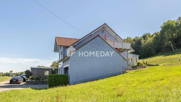 Immobilie in Lachen - Viel Platz für Wohnträume! Mehrfamilienhaus mit Doppelgarage und Naturblick - Bild 2